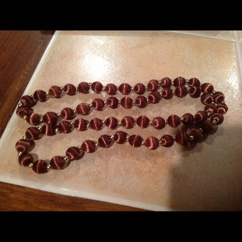 Brown Satin ball with gold beads necklace